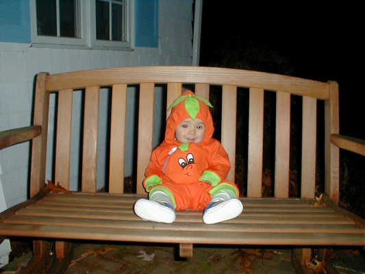 Little_pumpkin_on_the_porch_swing